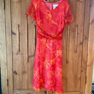 Beautiful Coldwater Creek coral, red orange lined dress with tie in back